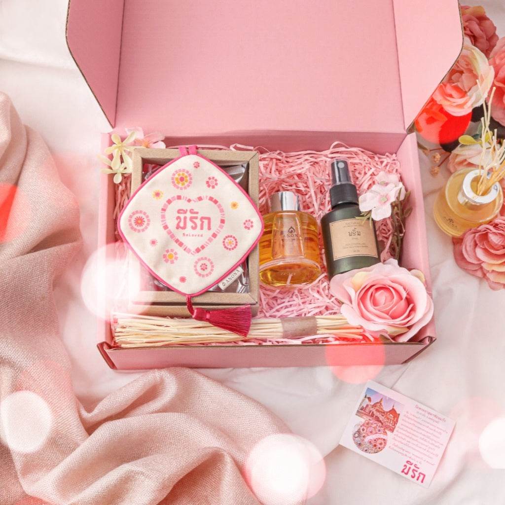 Valentine's Day aroma gift box by One-Sake.com with scented oils, diffuser sticks, and decorative rose in a pink box