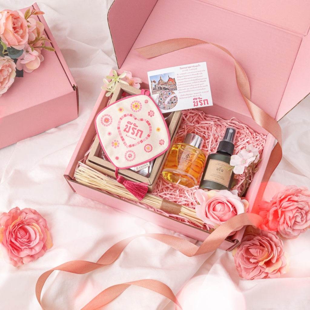 Valentine's Day aroma gift box with scented oil, diffuser sticks, and spray in pink packaging