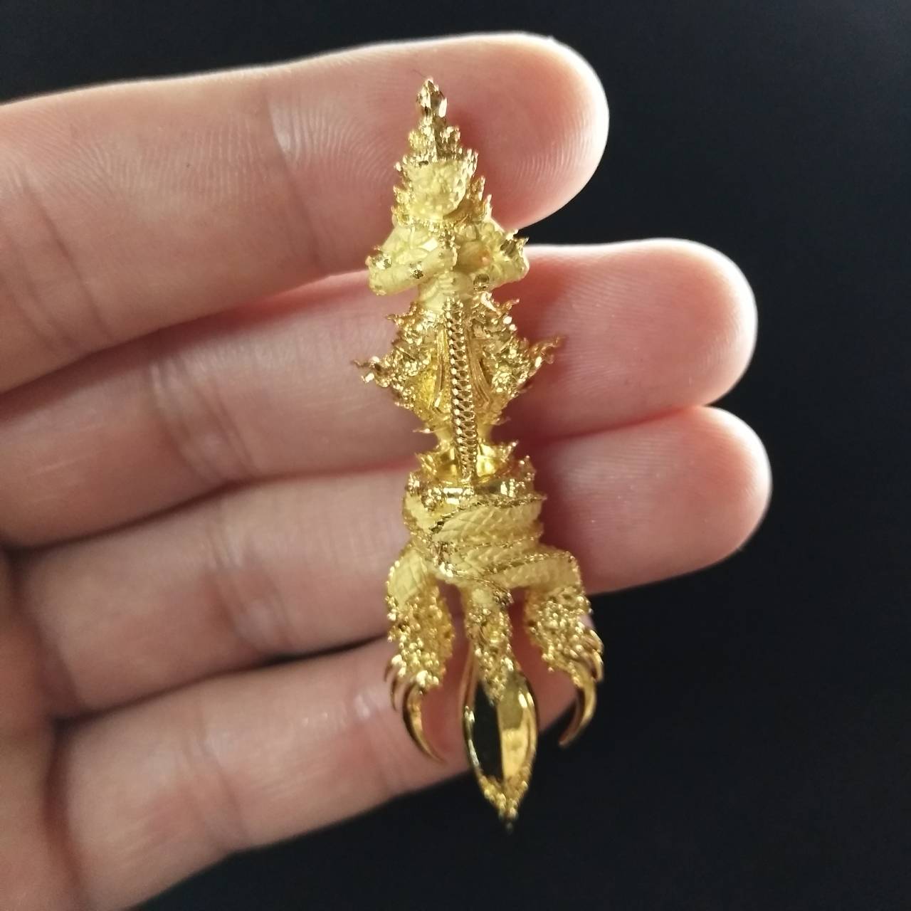 Vessuwan amulet for wealth in gold, intricately designed for prosperity and good fortune