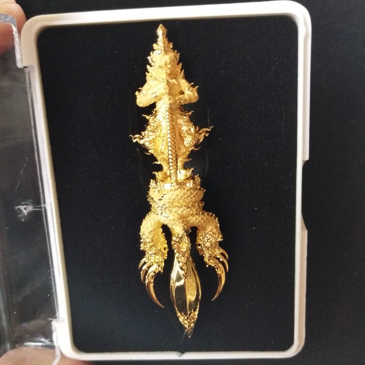 Vessuwan amulet for wealth in gold with intricate dragon design for decoration and good fortune