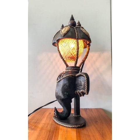 Vintage Thai home decor lamp shaped like an elephant head with warm glowing light
