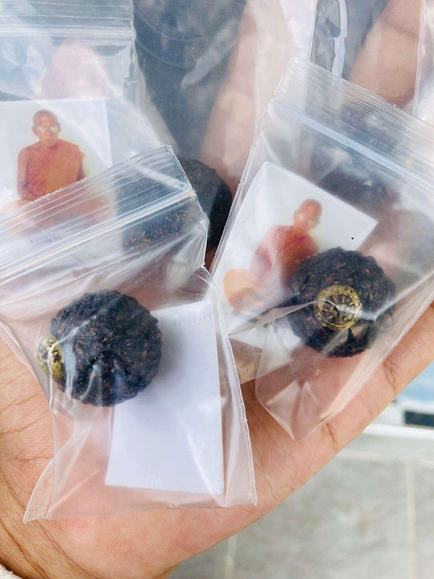 Sacred Black Sticky Rice Amulet - Luk Om Khao Niao Dam by Ajarn Jaroon