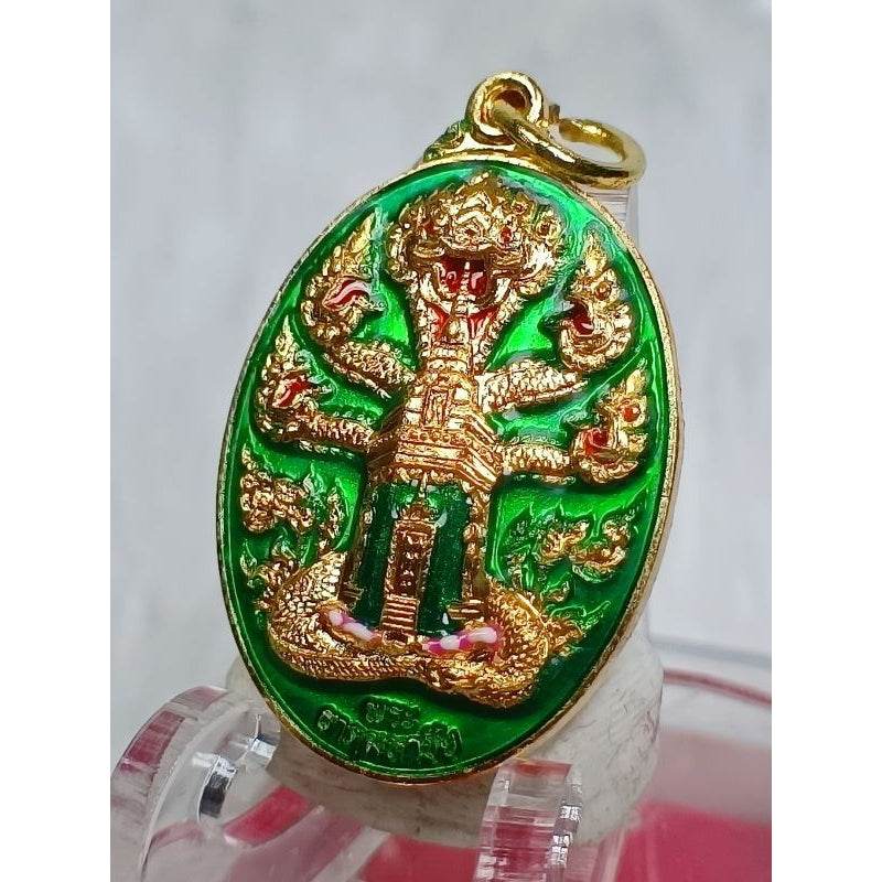 Wat That Mahachai authentic amulet with green and gold design featuring intricate multi-headed serpent on oval pendant