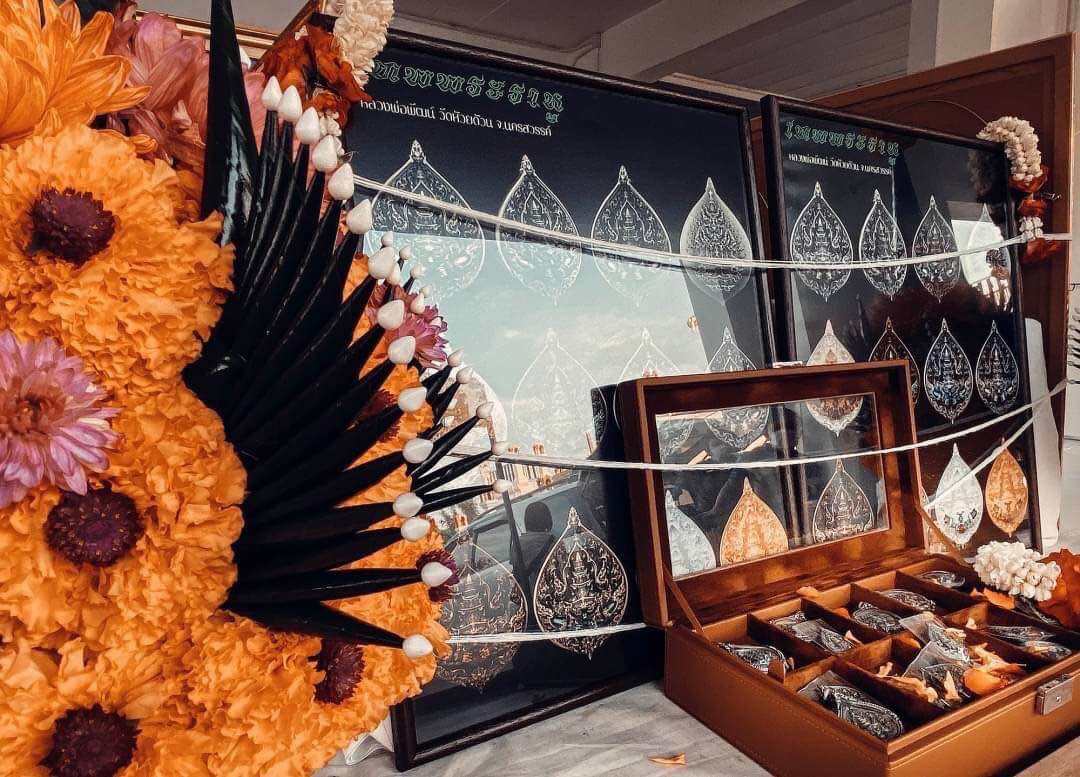 Phra Rahu amulet limited edition display with framed amulet prints wooden box and floral garlands