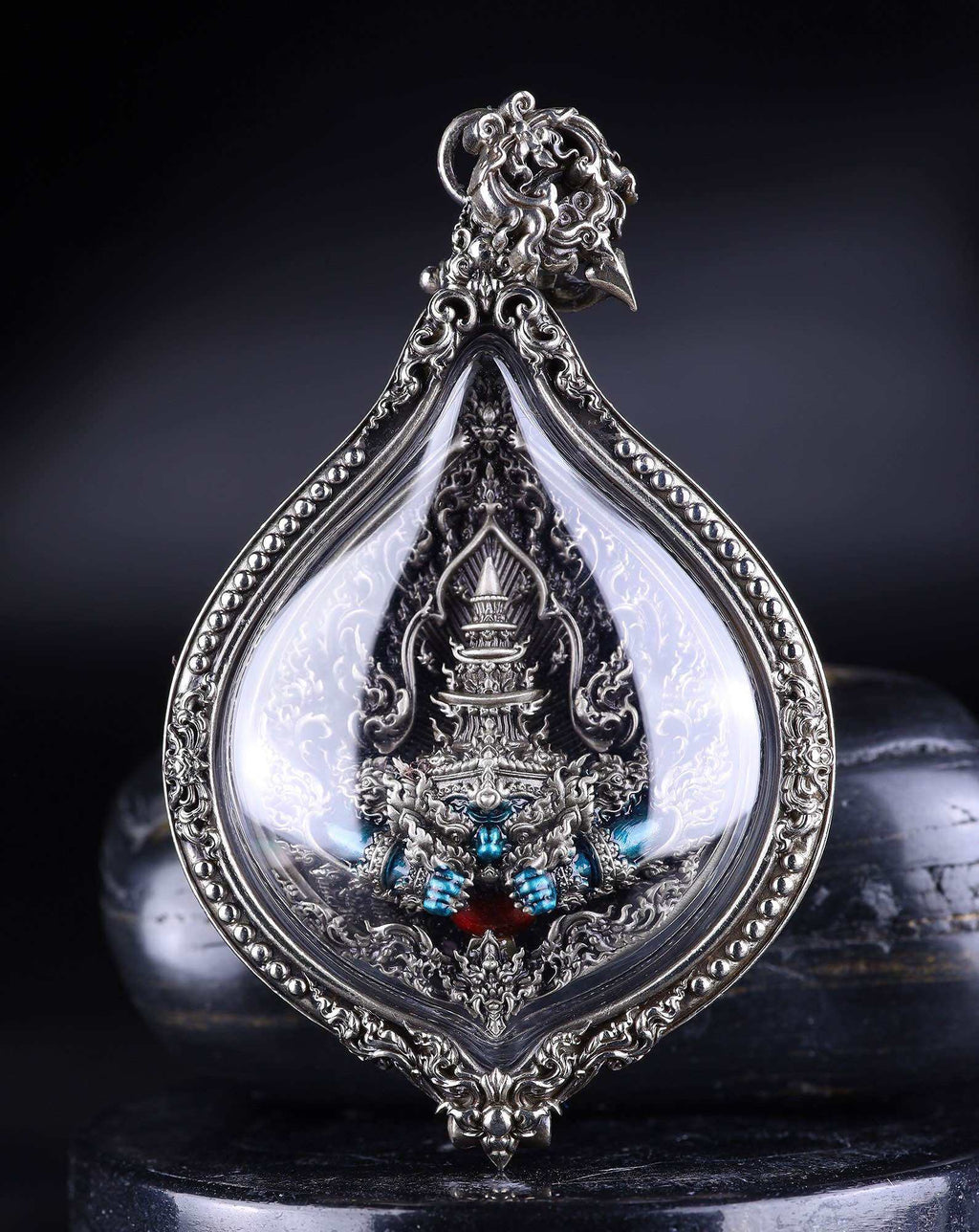 Phra Rahu amulet limited edition ornate silver teardrop pendant case with intricate carvings and gemstones