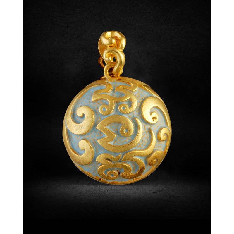 Gold and enamel round Naga Bak amulet Thailand pendant with intricate swirling naga motifs for protection and blessing