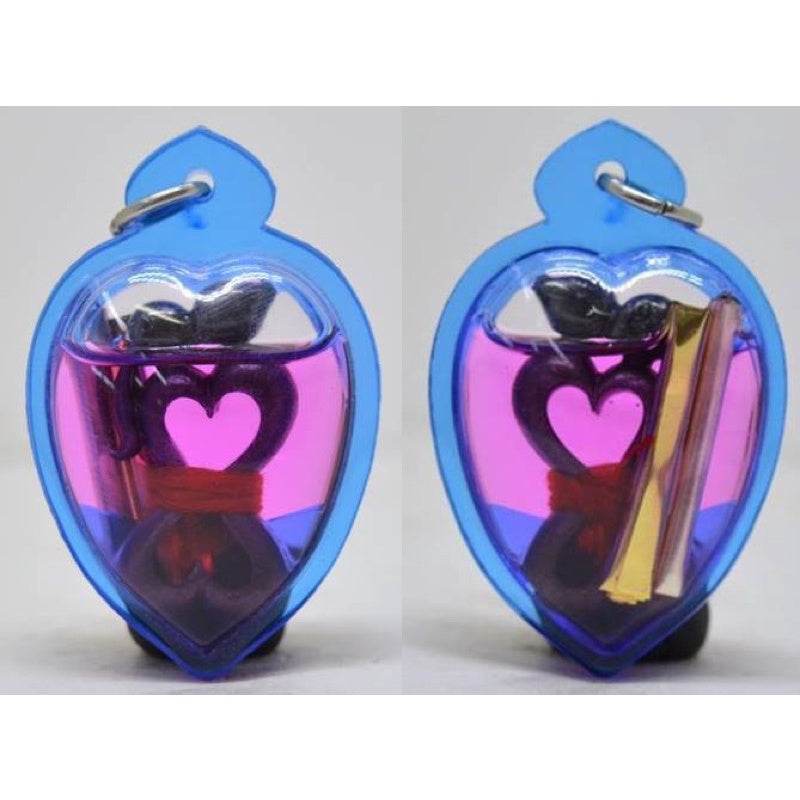 Yin Koo twin lovers amulet in a heart-shaped casing for love and harmony in homes