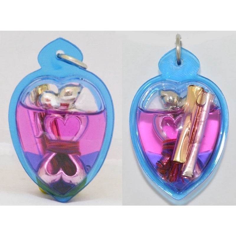 Yin Koo twin lovers amulet in a vibrant blue casing designed for love and relationship enhancement