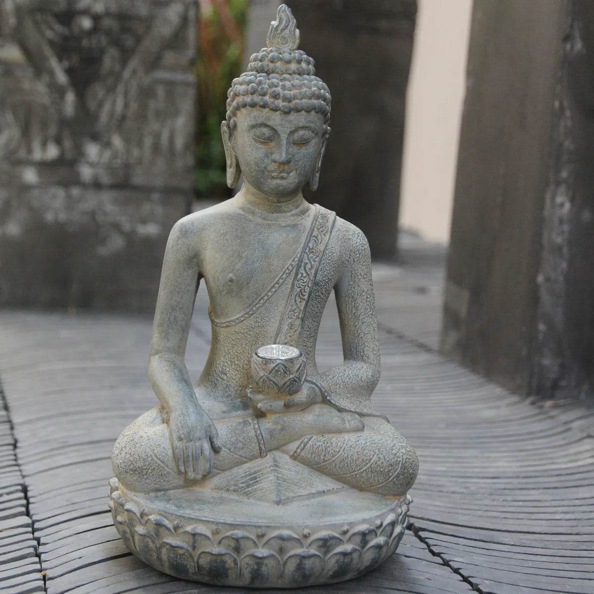 Thai Blessing Co solar powered Buddha garden statue seated on lotus base holding a small bowl outdoor decor