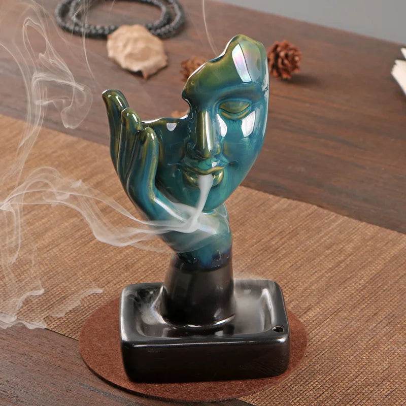 Thai Blessing Co teal ceramic face backflow incense burner for home with cascading smoke effect